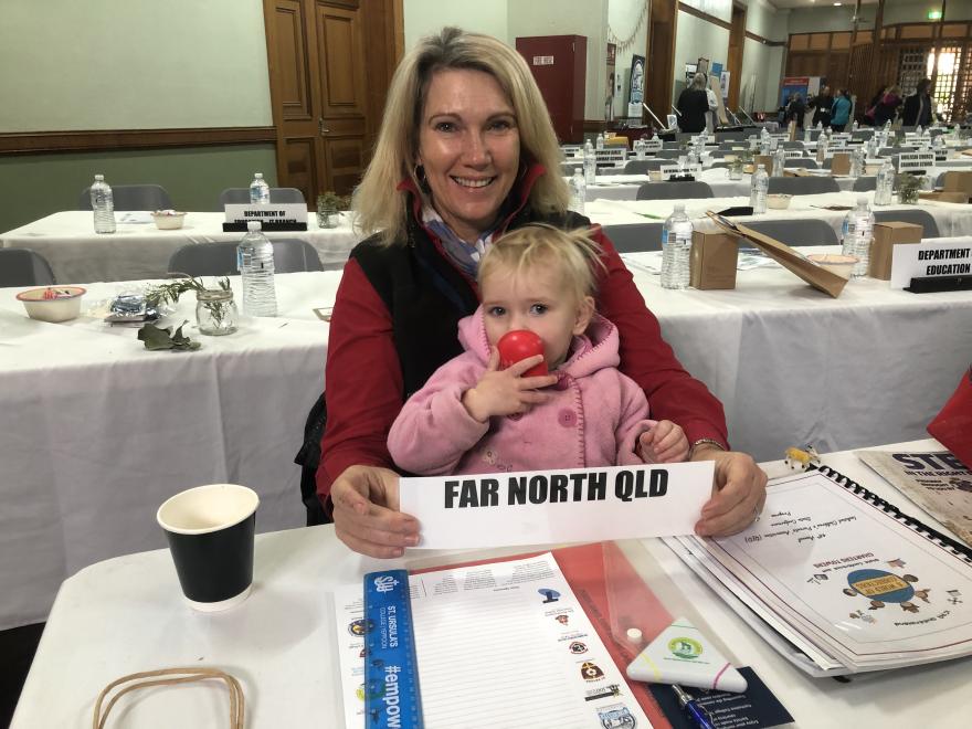 a picture of far north Qld branch member with a child on her lap