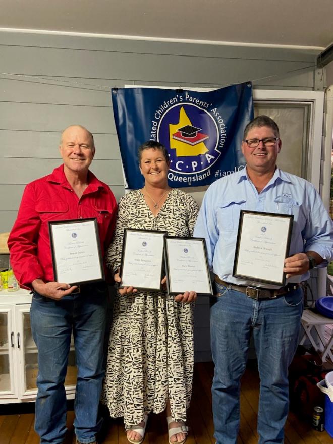 people holding awards