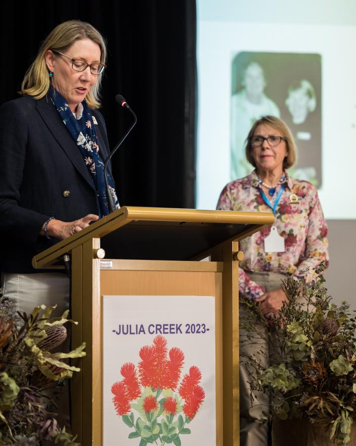 Louise presenting Judy with certficate