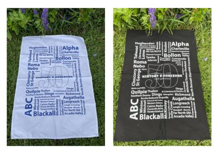 a picture of a white and black tea towel beside each other 