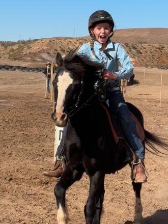 Little girl on a horse