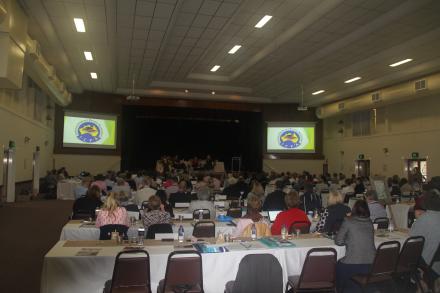 a photo of conference floor looking from back of room