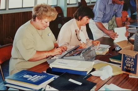 A photo of a woman typing