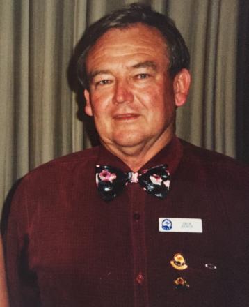 picture of Jack wearing maroon shirt and bowtie