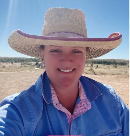 picture of Rahcel wearing blue shirt and straw hat