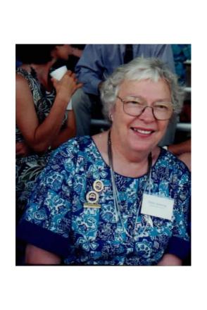 picture of Shirley wearing a blue floral top